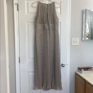 Metallic halter neck gown with thigh high split